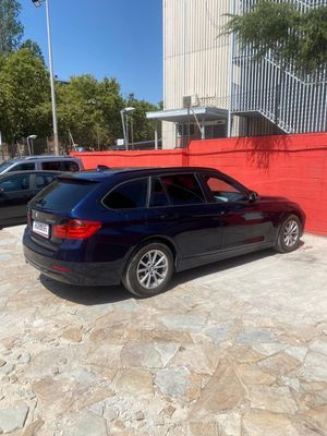 BMW Serie 3 320d xDrive Touring  - Foto 13