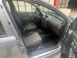 Opel Corsa Enjoy 1.2 16v  - Foto 24