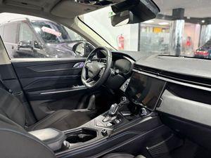 Lynk & Co 01 BASE	1.5 PHEV PINTURA METALIZADA NEGRA	TAPICERÍA NEGRA Y AZUL  - Foto 11