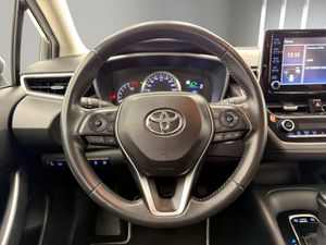 Toyota Corolla 1.8 125H BUSINESS E-CVT SEDAN  - Foto 11